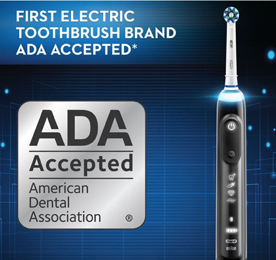 The image shows an electric toothbrush branded Ada with the American Dental Association logo.